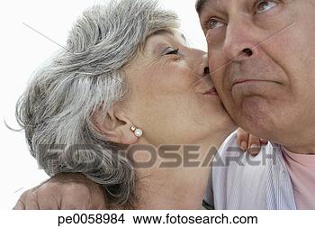 Stock Photo - woman kissing 
man. fotosearch 
- search stock 
photos, pictures, 
images, and photo 
clipart
