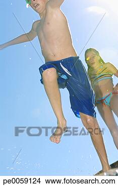Stock Photo - boy and girl in 
swimwear. fotosearch 
- search stock 
photos, pictures, 
images, and photo 
clipart