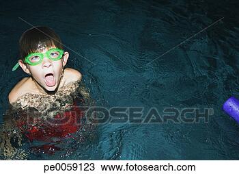 Stock Photo - boy wearing swim 
goggles in swimming 
pool. fotosearch 
- search stock 
photos, pictures, 
images, and photo 
clipart