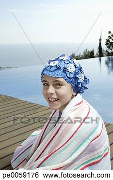 Stock Photo - girl on deck by 
infinity pool. 
fotosearch - search 
stock photos, 
pictures, images, 
and photo clipart