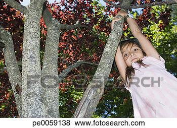 Stock Photo - girl swinging 
from tree branch. 
fotosearch - search 
stock photos, 
pictures, images, 
and photo clipart