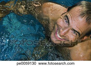 Stock Photography - man in swimming 
pool looking up. 
fotosearch - search 
stock photos, 
pictures, images, 
and photo clipart