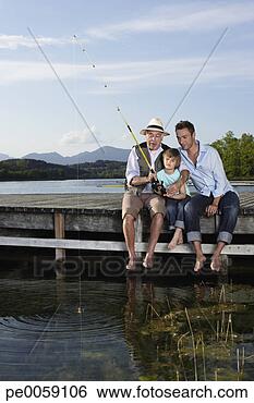 Stock Photo - two men fishing 
with young boy 
on dock. fotosearch 
- search stock 
photos, pictures, 
images, and photo 
clipart