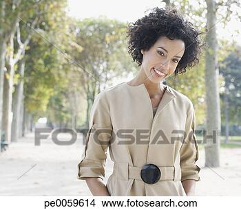 Stock Photo - businesswoman 
outdoors in park. 
fotosearch - search 
stock photos, 
pictures, images, 
and photo clipart