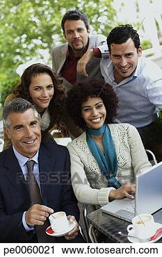 Stock Photography - five businesspeople 
on outdoor patio 
with laptop. fotosearch 
- search stock 
photos, pictures, 
images, and photo 
clipart