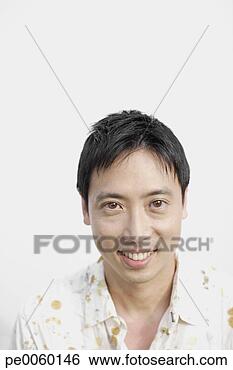 Stock Photo - man indoors smiling. 
fotosearch - search 
stock photos, 
pictures, images, 
and photo clipart