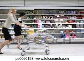 Stock Photo - two women in drug 
store running 
with shopping 
carts. fotosearch 
- search stock 
photos, pictures, 
images, and photo 
clipart
