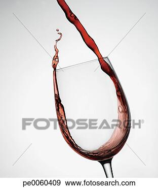Stock Photograph - red wine pouring 
into glass indoors. 
fotosearch - search 
stock photos, 
pictures, images, 
and photo clipart