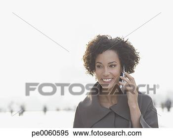 Banco de Imagem - executiva,  móvel, 
 telefone,  ao 
ar livre. fotosearch 
- busca de fotos, 
imagens e clipart