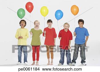 Stock Photo - five children 
indoors holding 
balloons and shouting. 
fotosearch - search 
stock photos, 
pictures, images, 
and photo clipart