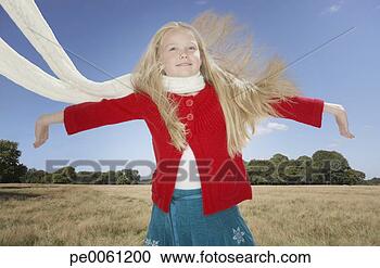Stock Photography - young girl outdoors 
jumping. fotosearch 
- search stock 
photos, pictures, 
images, and photo 
clipart