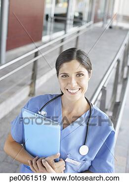 Arquivo Fotográficos - hospitalar,   
trabalhador,  
 ficar,   exterior, 
  hospitalar. 
fotosearch - busca 
de fotos, imagens 
e clipart