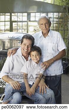 Picture - senior man with 
man and young 
boy outdoors leaning 
on car smiling. 
fotosearch - search 
stock photos, 
pictures, images, 
and photo clipart