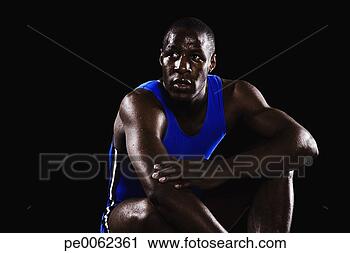 Stock Photography - athlete crouching 
down and tired. 
fotosearch - search 
stock photos, 
pictures, images, 
and photo clipart
