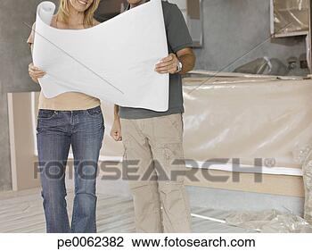 Banco de Imagem - par,  segurando, 
 desenhos técnicos, 
 novo,  lar. fotosearch 
- busca de fotos, 
imagens e clipart