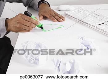 Picture - businessman drawing 
recycling symbol 
on desk with marker. 
fotosearch - search 
stock photos, 
pictures, images, 
and photo clipart