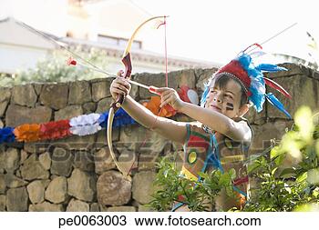 Stock Photo - young boy in indian
costume pointing
bow and arrow.
fotosearch - search
stock photos,
pictures, images,
and photo clipart