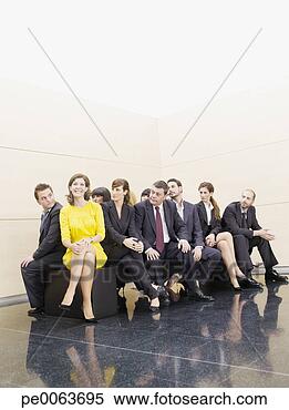 Stock Image - businesspeople 
staring at unique 
co-worker. fotosearch 
- search stock 
photos, pictures, 
images, and photo 
clipart