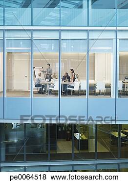 Stock Photo - businesspeople 
having meeting 
in conference 
room. fotosearch 
- search stock 
photos, pictures, 
images, and photo 
clipart
