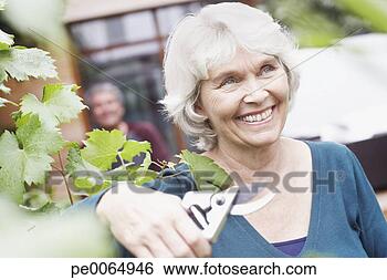 senior-woman-holding_~pe0064946.jpg