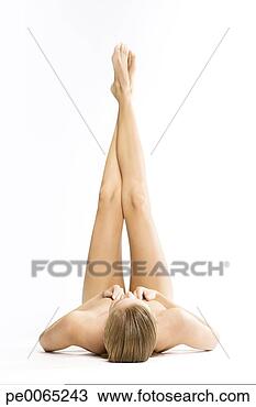 Stock Photo - nude woman raising 
legs. fotosearch 
- search stock 
photos, pictures, 
images, and photo 
clipart