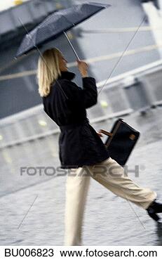 Stock Photo - businesswoman 
hurrying. fotosearch 
- search stock 
photos, pictures, 
images, and photo 
clipart