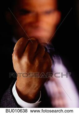Stock Photo - man's clenched 
fist. fotosearch 
- search stock 
photos, pictures, 
images, and photo 
clipart