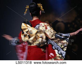 Stock Photo - woman in traditional 
asian dress. fotosearch 
- search stock 
photos, pictures, 
images, and photo 
clipart