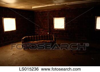 Stock Photo - couch in deserted 
room. fotosearch 
- search stock 
photos, pictures, 
images, and photo 
clipart