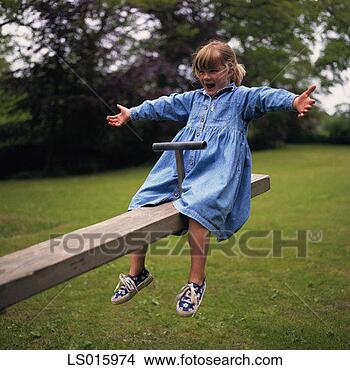 Stock Photo - girl on a see 
saw. fotosearch 
- search stock 
photos, pictures, 
images, and photo 
clipart
