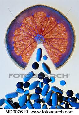 Stock Photograph - vitamins, minerals 
and an orange 
slice. fotosearch 
- search stock 
photos, pictures, 
images, and photo 
clipart