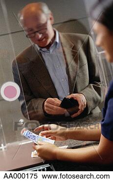 Stock Image - man at the currency 
exchange. fotosearch 
- search stock 
photos, pictures, 
images, and photo 
clipart