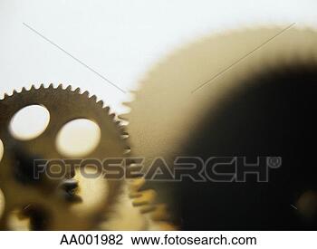 Stock Photo - close-up of interlocking 
gears. fotosearch 
- search stock 
photos, pictures, 
images, and photo 
clipart