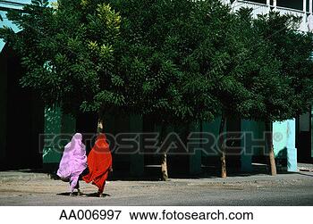 Picture - behind view of 
two women walking 
in kenya. fotosearch 
- search stock 
photos, pictures, 
images, and photo 
clipart
