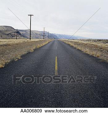 Stock Photograph - desolate highway. 
fotosearch - search 
stock photos, 
pictures, images, 
and photo clipart