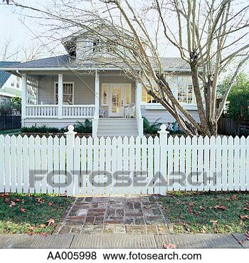 Stock Photo - picket fence in 
front of a house. 
fotosearch - search 
stock photos, 
pictures, images, 
and photo clipart