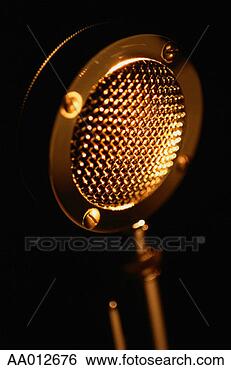 Stock Photo - close-up view 
of a microphone. 
fotosearch - search 
stock photos, 
pictures, images, 
and photo clipart