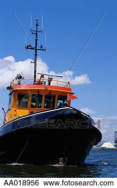 Stock Photo - tug boat in amsterdam, 
netherlands. fotosearch 
- search stock 
photos, pictures, 
images, and photo 
clipart
