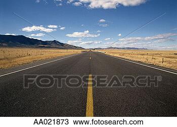 Stock Photo - empty road in 
an arid landscape. 
fotosearch - search 
stock photos, 
pictures, images, 
and photo clipart
