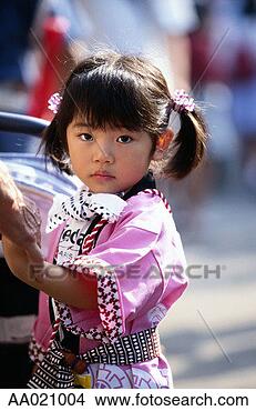 Stock Photo - girl dressed in 
a costume at a 
festival. fotosearch 
- search stock 
photos, pictures, 
images, and photo 
clipart
