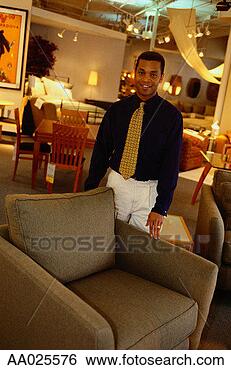 Stock Photo - furniture salesman. 
fotosearch - search 
stock photos, 
pictures, images, 
and photo clipart