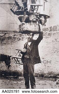 Stock Photography - man balancing 
basket and chairs 
on his head. fotosearch 
- search stock 
photos, pictures, 
images, and photo 
clipart