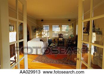 Stock Photo - living room seen 
through french 
doors. fotosearch 
- search stock 
photos, pictures, 
images, and photo 
clipart