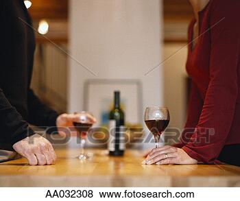 Stock Photo - couple with red 
wine. fotosearch 
- search stock 
photos, pictures, 
images, and photo 
clipart