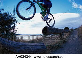 Stock Photo - mountain bike 
stunt. fotosearch 
- search stock 
photos, pictures, 
images, and photo 
clipart