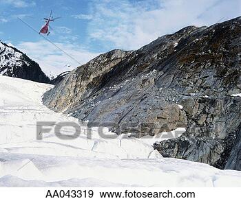 Stock Photograph - helicopter flying 
over alaskan ice 
field. fotosearch 
- search stock 
photos, pictures, 
images, and photo 
clipart