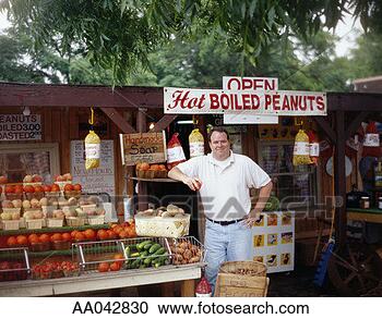 Stock Photography - man and his vegetable 
stand. fotosearch 
- search stock 
photos, pictures, 
images, and photo 
clipart