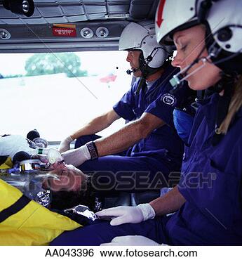 Stock Photo - medevac paramedics 
with patient. 
fotosearch - search 
stock photos, 
pictures, images, 
and photo clipart