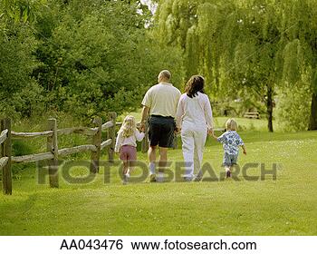 Stock Photo - mother and father 
walking with children 
(3-7) rear view. 
fotosearch - search 
stock photos, 
pictures, images, 
and photo clipart