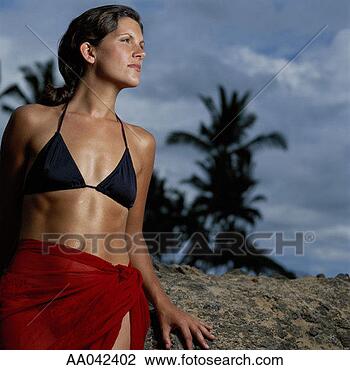 Stock Photo - portrait of a 
woman on a tropical 
beach. fotosearch 
- search stock 
photos, pictures, 
images, and photo 
clipart